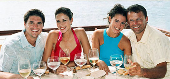 Two couples having fun on the deck.